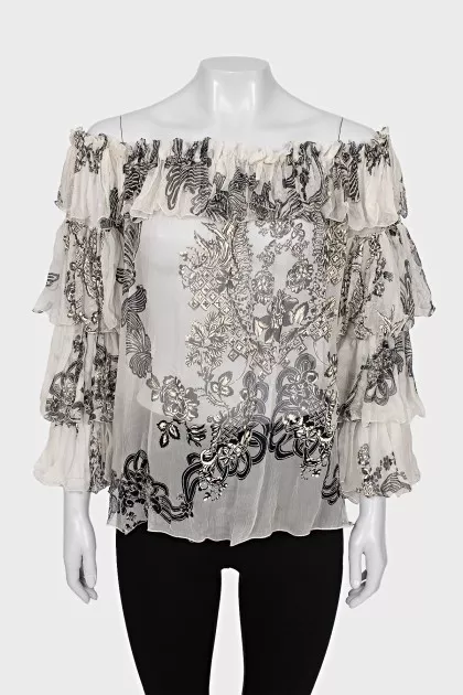 Sheer blouse with printed pleats