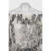 Sheer blouse with printed pleats