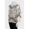 Sheer blouse with printed pleats