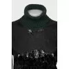 Green sweater with patent leather element