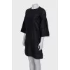 Straight cut dress decorated with frills