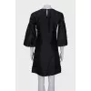 Straight cut dress decorated with frills