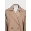Beige double-breasted raincoat