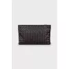 Woven leather clutch