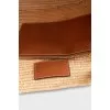 Raffia bag with figured weave