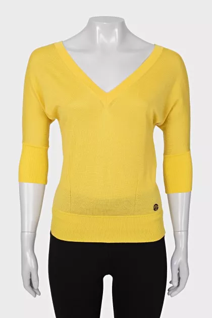 Yellow pullover with a cutout on the back