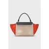 Trapeze leather and suede bag