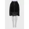 Lush skirt made of openwork fabric