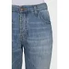 Cropped jeans with distressed buttons