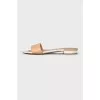 Beige leather flip flops