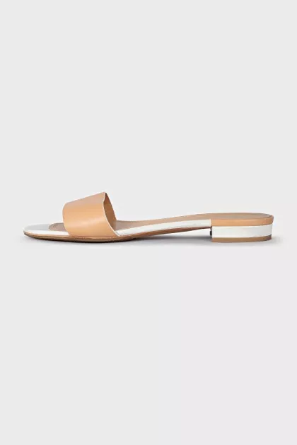 Beige leather flip flops
