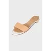 Beige leather flip flops
