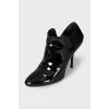 Patent leather ankle boots with textile back