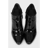 Patent leather ankle boots with textile back