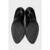 Patent leather ankle boots with textile back