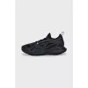 Black sneakers made of rubber and textile