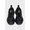 Black sneakers made of rubber and textile