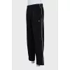 Men's striped track pants with tag