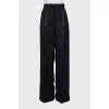 Straight trousers with white stitching