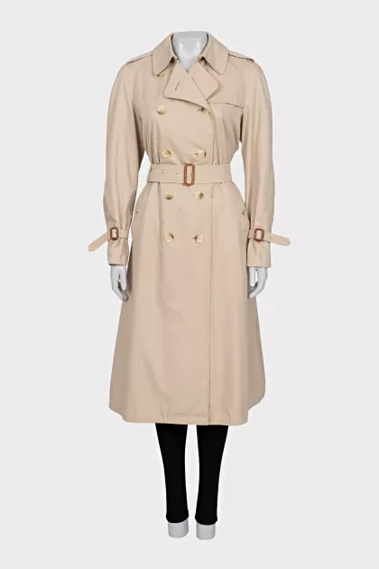 Beige trench coat with plaid lining