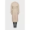 Beige trench coat with plaid lining