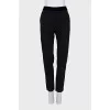 Black trousers with a zipper