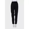 Black trousers with a zipper