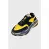 Men's black and yellow Triple S sneakers