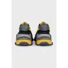 Men's black and yellow Triple S sneakers