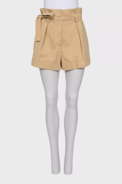 Beige shorts with a belt