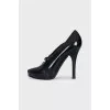 Black shoes with a shaped cutout