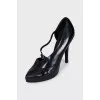 Black shoes with a shaped cutout