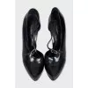 Black shoes with a shaped cutout