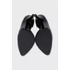 Black shoes with a shaped cutout
