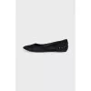 Black ballet flats with gold trim