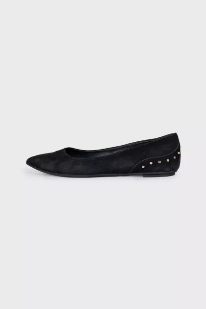 Black ballet flats with gold trim