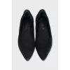 Black ballet flats with gold trim