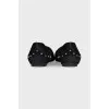 Black ballet flats with gold trim