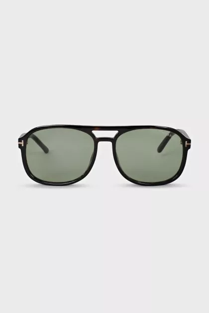 Green sunglasses with spotted frames