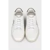 White leather sneakers with branded embroidery