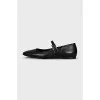 Leather ballet flats with a strap