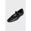 Leather ballet flats with a strap