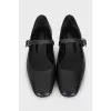 Leather ballet flats with a strap