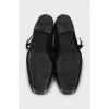 Leather ballet flats with a strap