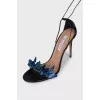 Leather sandals decorated with butterflies