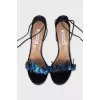 Leather sandals decorated with butterflies
