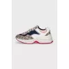 Sneakers with the Rhyton signature print