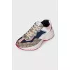 Sneakers with the Rhyton signature print