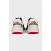 Sneakers with the Rhyton signature print