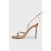 Gold lace-up sandals